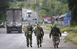 Pojazdy z uzbrojonymi ludźmi z Rosji na Ukrainie